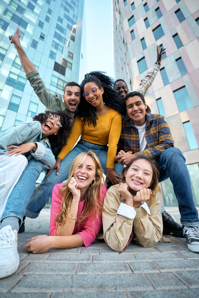 Vertical.,A,Group,Of,Happy,People,Is,Sharing,A,Fun